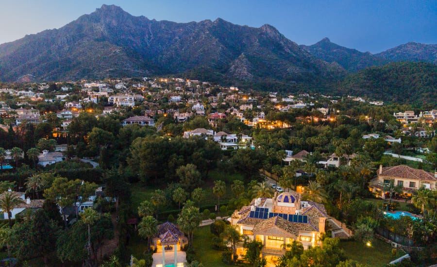 Twilight over Sierra Blanca's luxurious neighborhood with La Concha mountain backdrop in Marbella.